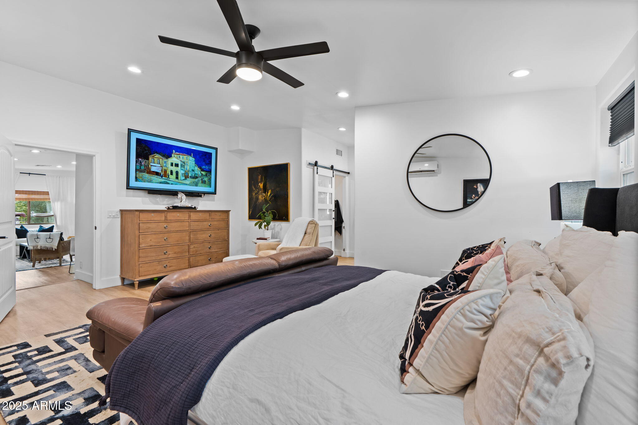 6835 East Peak View Road Scottsdale, AZ 85266 - Photo 97 of 107 a bedroom with bed and a chandelier