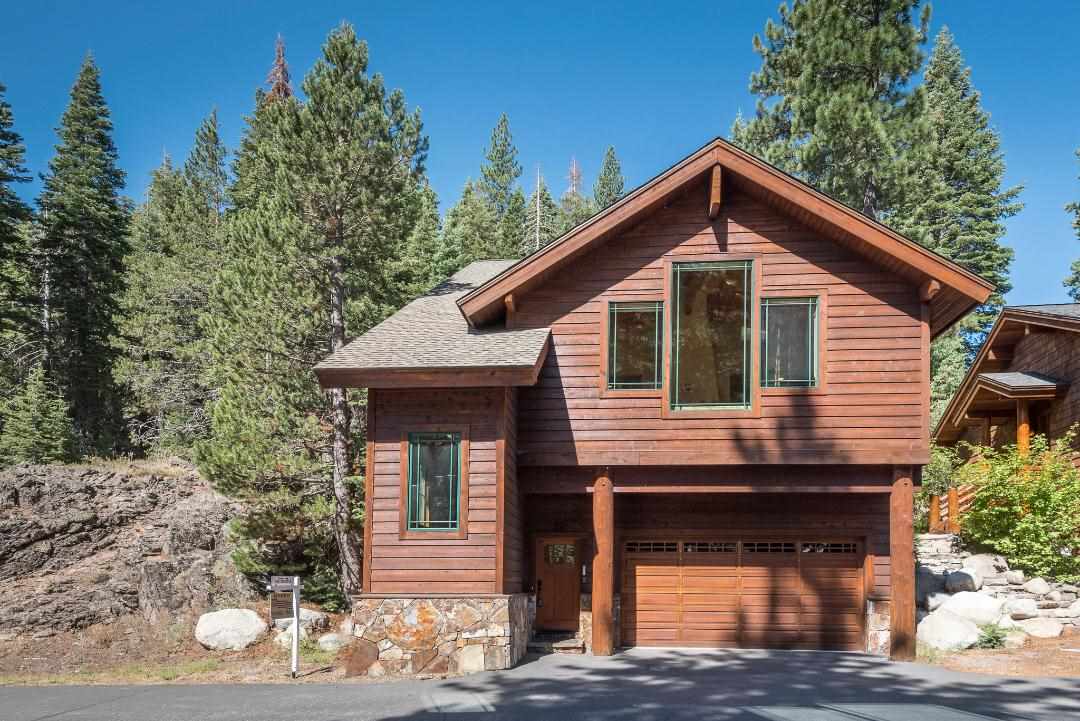 135 Alpine Meadows Road, Unit 32 Alpine Meadows, CA 96145 - Photo 1 of 20 a front view of a house with yard