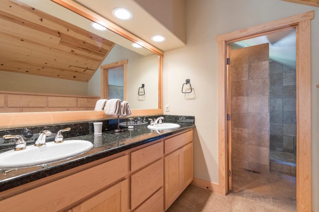 135 Alpine Meadows Road, Unit 32 Alpine Meadows, CA 96145 - Photo 12 of 20 a bathroom with a sink and a mirror