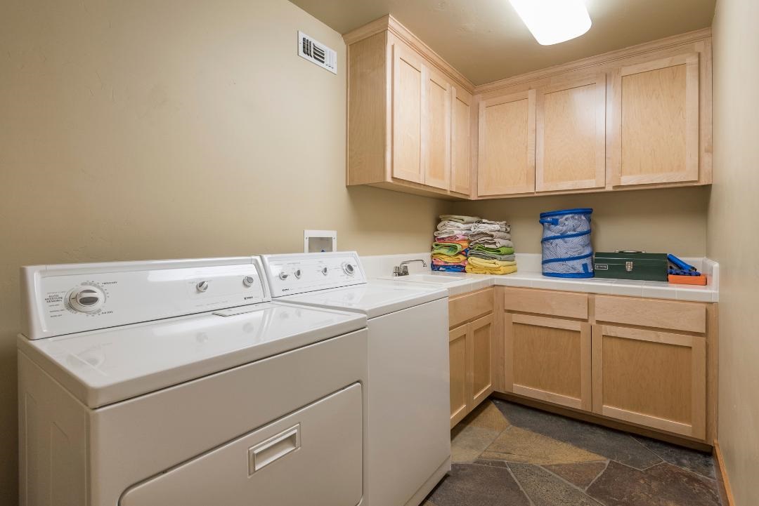 135 Alpine Meadows Road, Unit 32 Alpine Meadows, CA 96145 - Photo 18 of 20 a utility room with dryer and washer