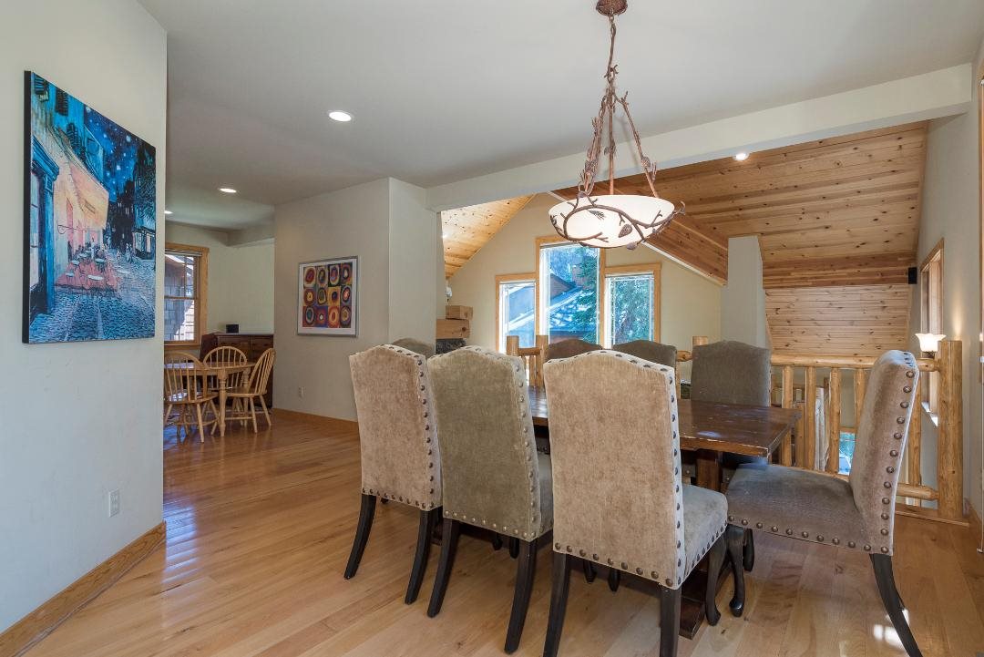 135 Alpine Meadows Road, Unit 32 Alpine Meadows, CA 96145 - Photo 19 of 20 a view of a dining room with furniture and wooden floor