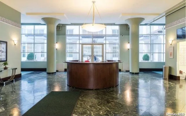 a view of a living room and dining room