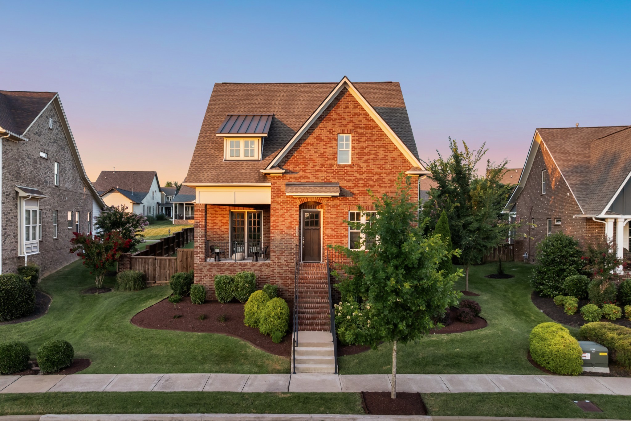 3210 Natoma Circle Thompson's Station, TN 37179 - Photo 2 of 63 a front view of house with yard and green space