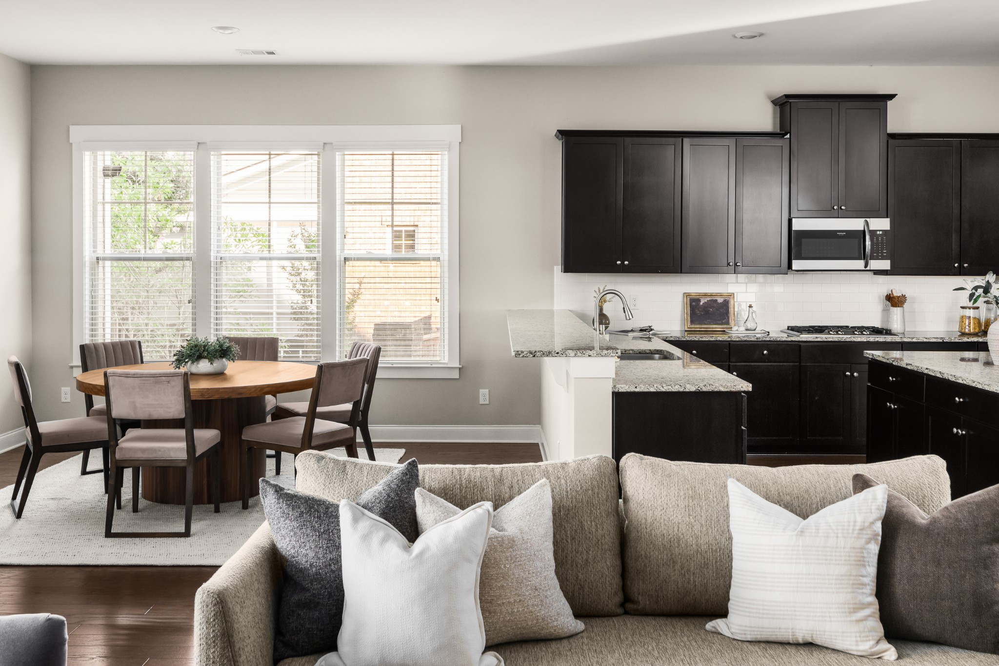 3210 Natoma Circle Thompson's Station, TN 37179 - Photo 22 of 63 a living room with furniture a large window and a sink