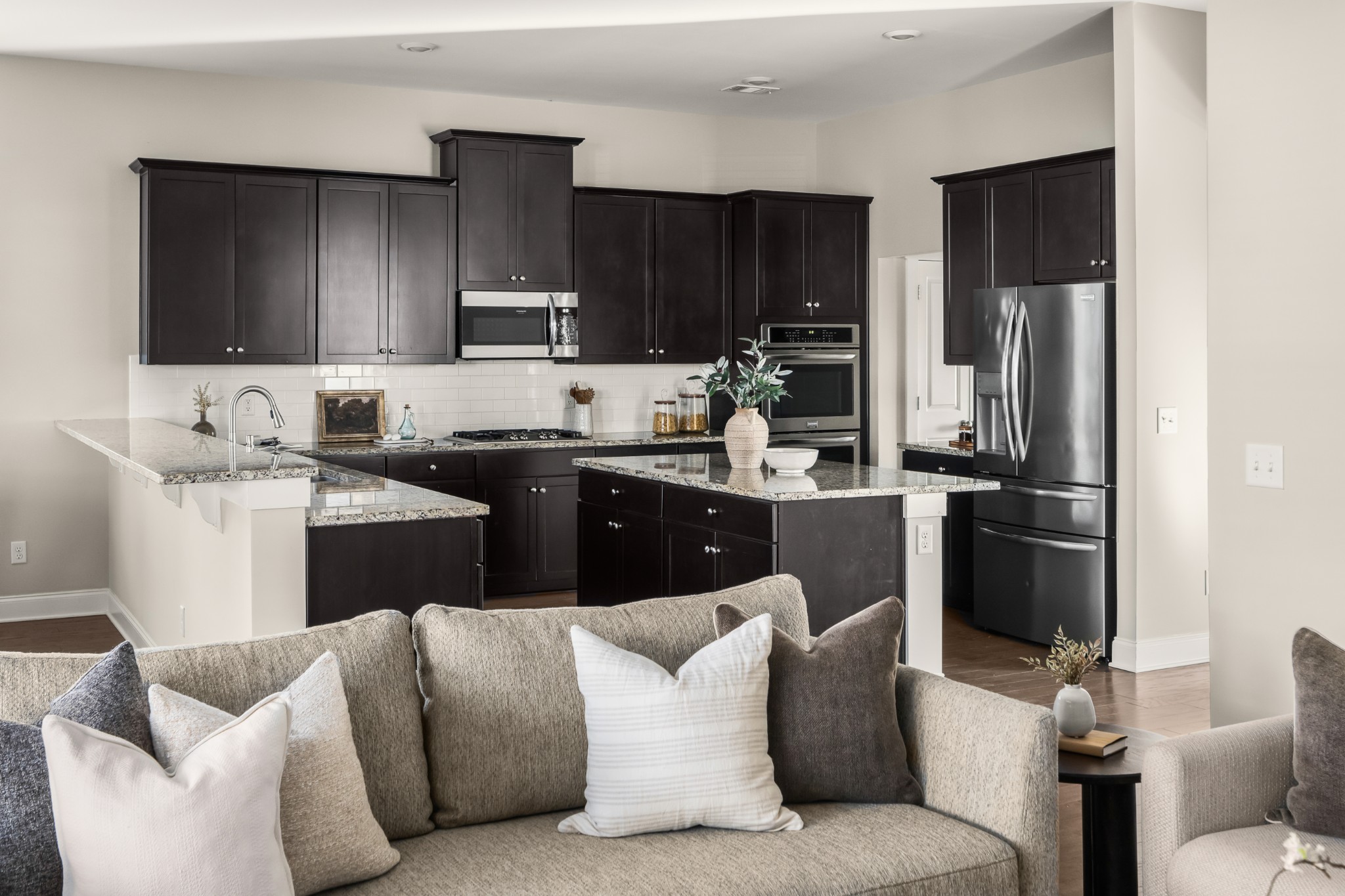3210 Natoma Circle Thompson's Station, TN 37179 - Photo 23 of 63 a kitchen with a sink and cabinets