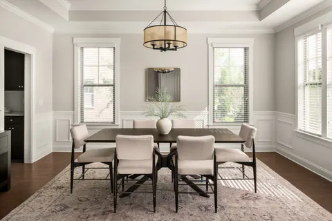 a bathroom with a sink a mirror and a toilet