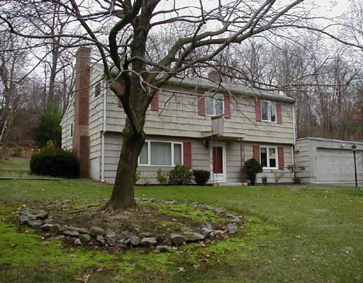 31 Shawnee Road Trumbull, CT 06611 - Photo 1 of 1 a front view of a house with a yard