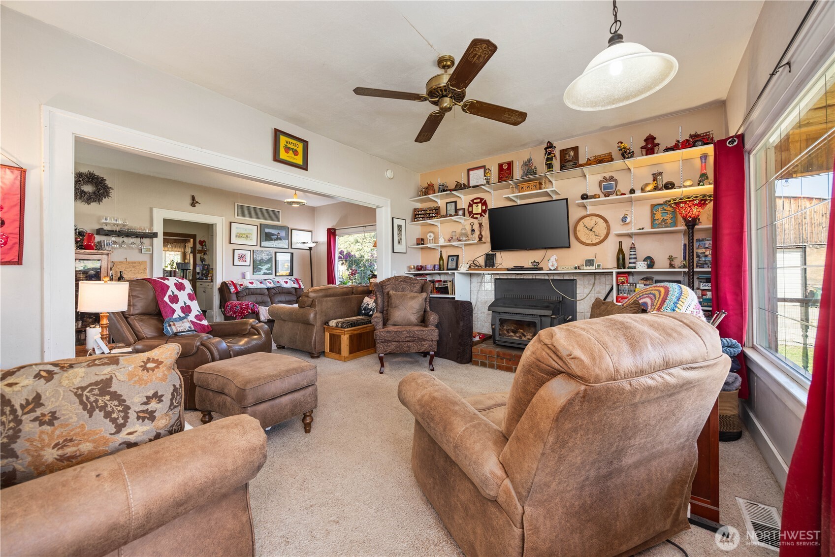 1281 Totem Pole Road Manson, WA 98831 - Photo 3 of 39 a living room with furniture and a fireplace