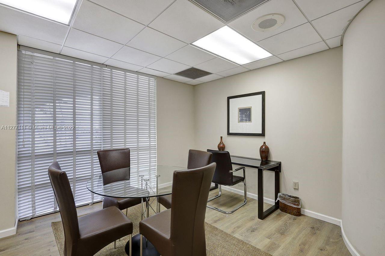 2351 Douglas Road, Unit 908 Miami, FL 33145 - Photo 29 of 37 a view of a livingroom with furniture