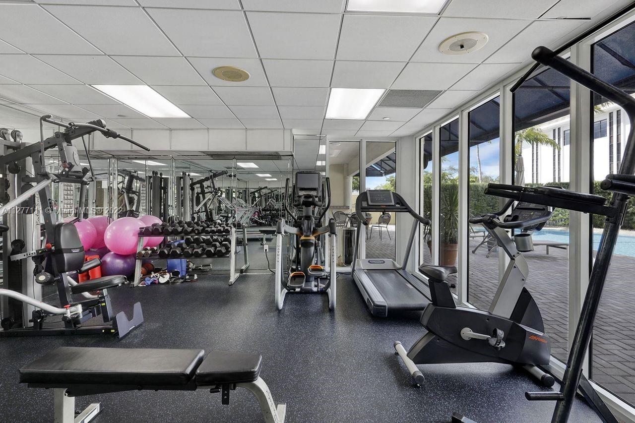 2351 Douglas Road, Unit 908 Miami, FL 33145 - Photo 37 of 37 a view of a room with gym equipment