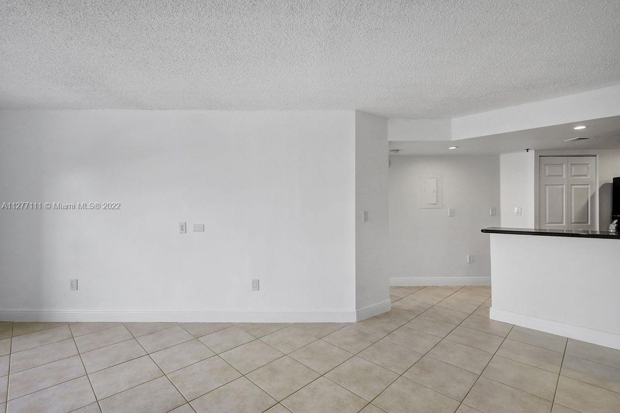 2351 Douglas Road, Unit 908 Miami, FL 33145 - Photo 6 of 37 a view of an empty room