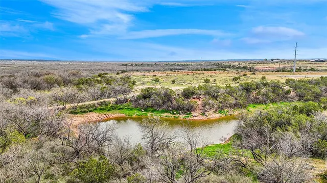a view of lake and mountain