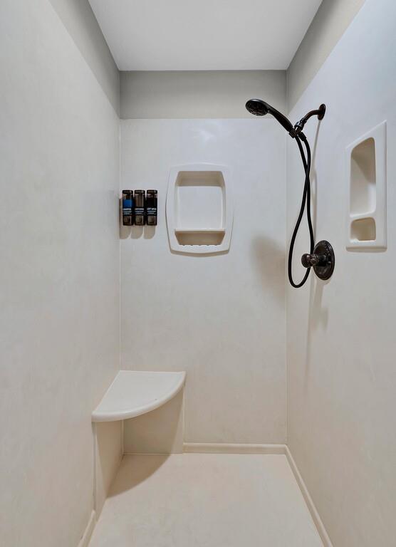 655 Buster Chatham Road Waco, TX 76705 - Photo 19 of 40 a bathroom with a toilet and a shower