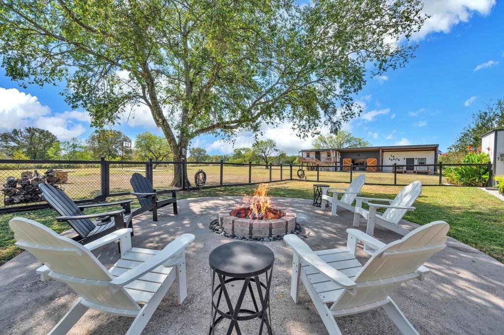 655 Buster Chatham Road Waco, TX 76705 - Photo 28 of 40 a view of a patio with chairs and a table