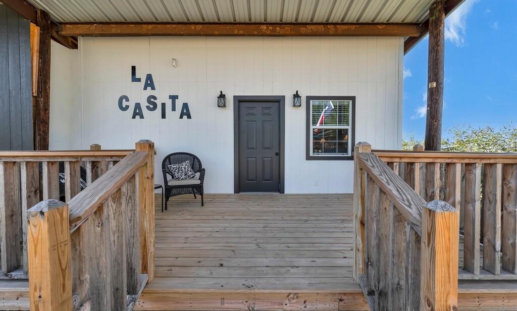 655 Buster Chatham Road Waco, TX 76705 - Photo 32 of 40 a view of wooden door and stairs