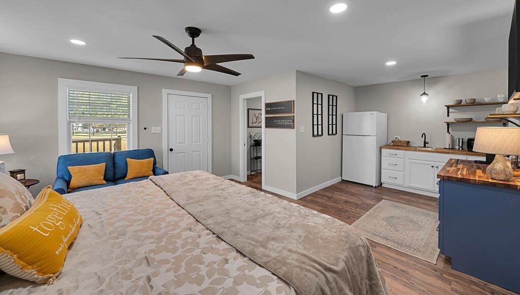 655 Buster Chatham Road Waco, TX 76705 - Photo 33 of 40 a bedroom with a bed dresser and a window