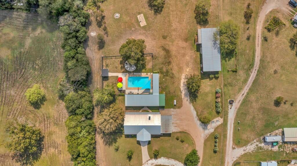 655 Buster Chatham Road Waco, TX 76705 - Photo 38 of 40 an aerial view of residential houses with outdoor space