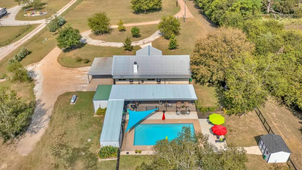 655 Buster Chatham Road Waco, TX 76705 - Photo 39 of 40 an aerial view of a house with a swimming pool