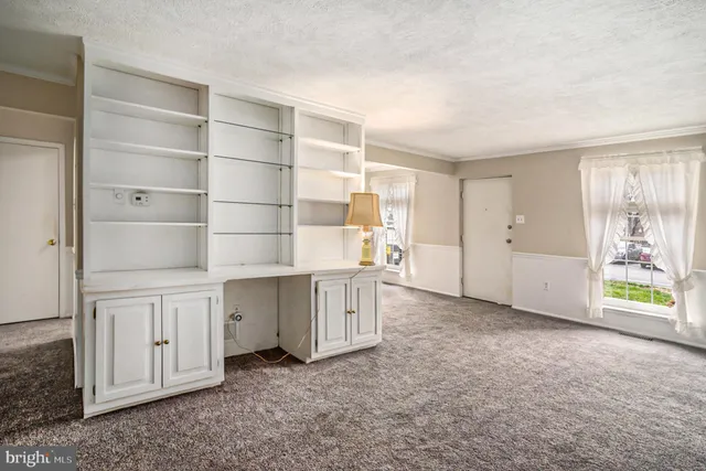 an empty room with a empty shelves