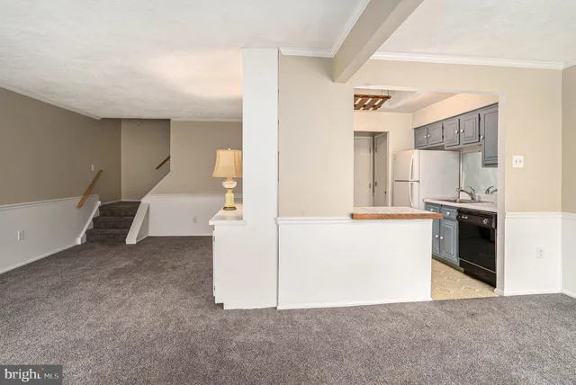 a view of a kitchen with a sink