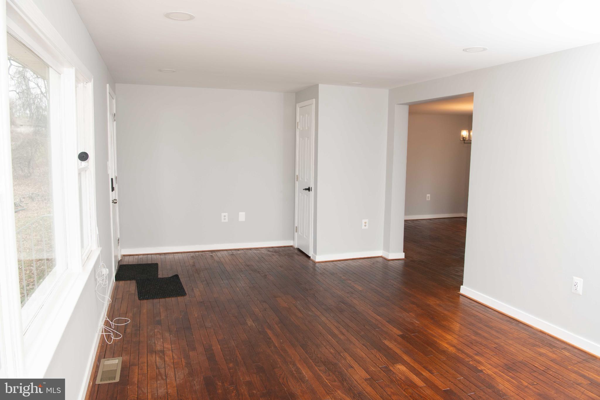 4785 Mountain Road Pasadena, MD 21122 - Photo 14 of 30 Spacious, light-filled living area awaits you.