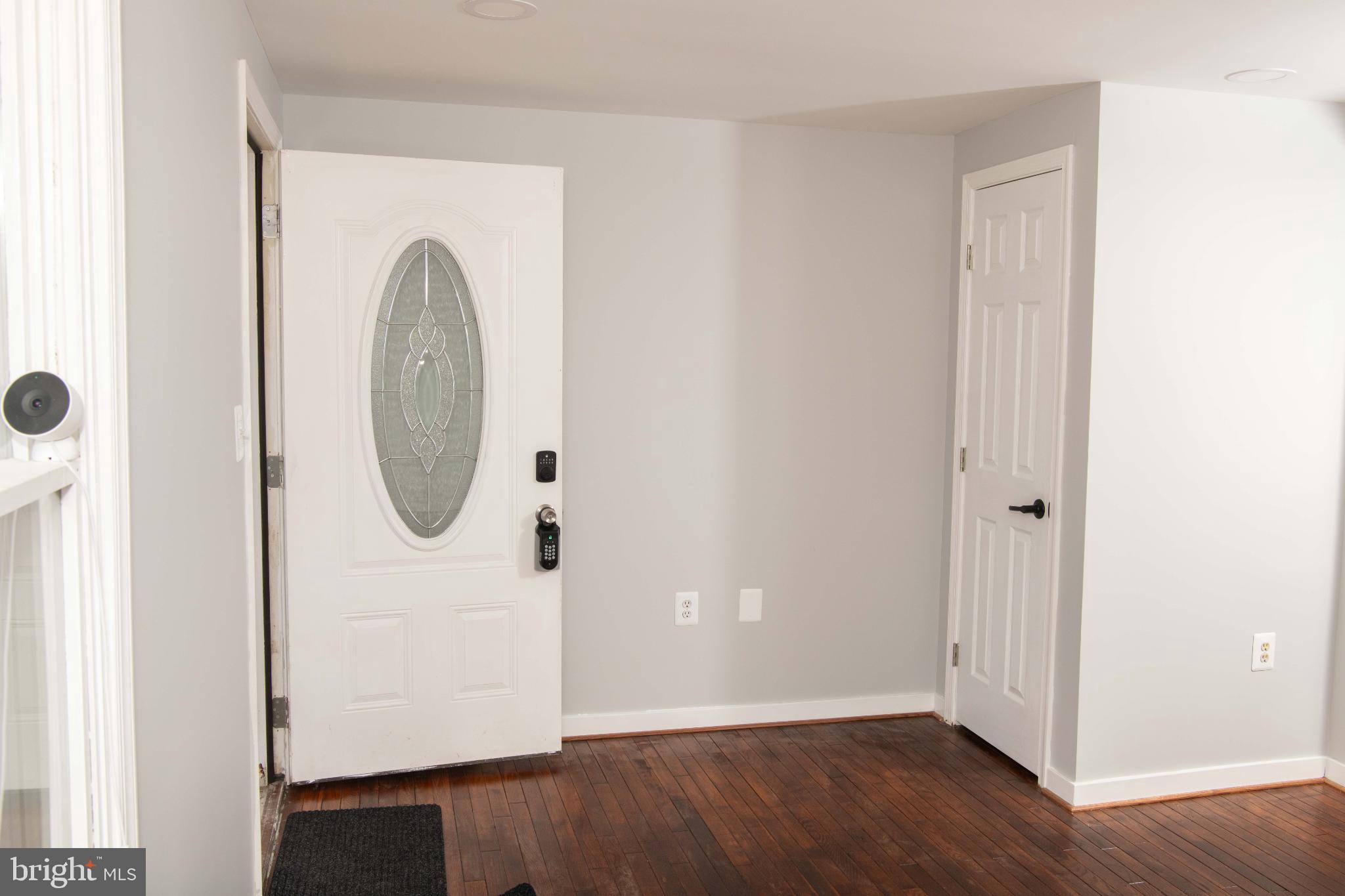4785 Mountain Road Pasadena, MD 21122 - Photo 17 of 30 Welcoming entryway with modern charm.