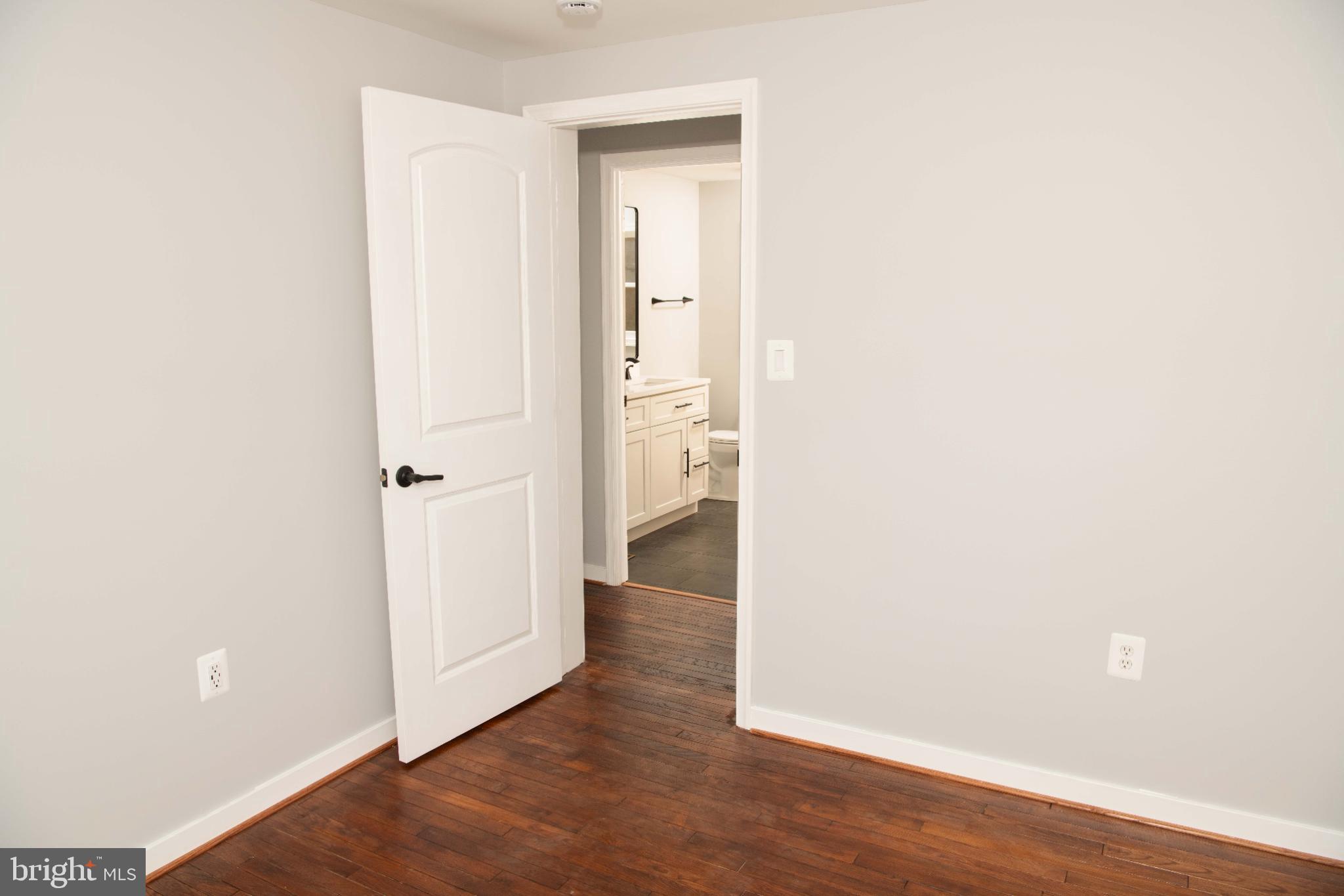 4785 Mountain Road Pasadena, MD 21122 - Photo 24 of 30 Bright, inviting Bedroom #3 with modern finishes.