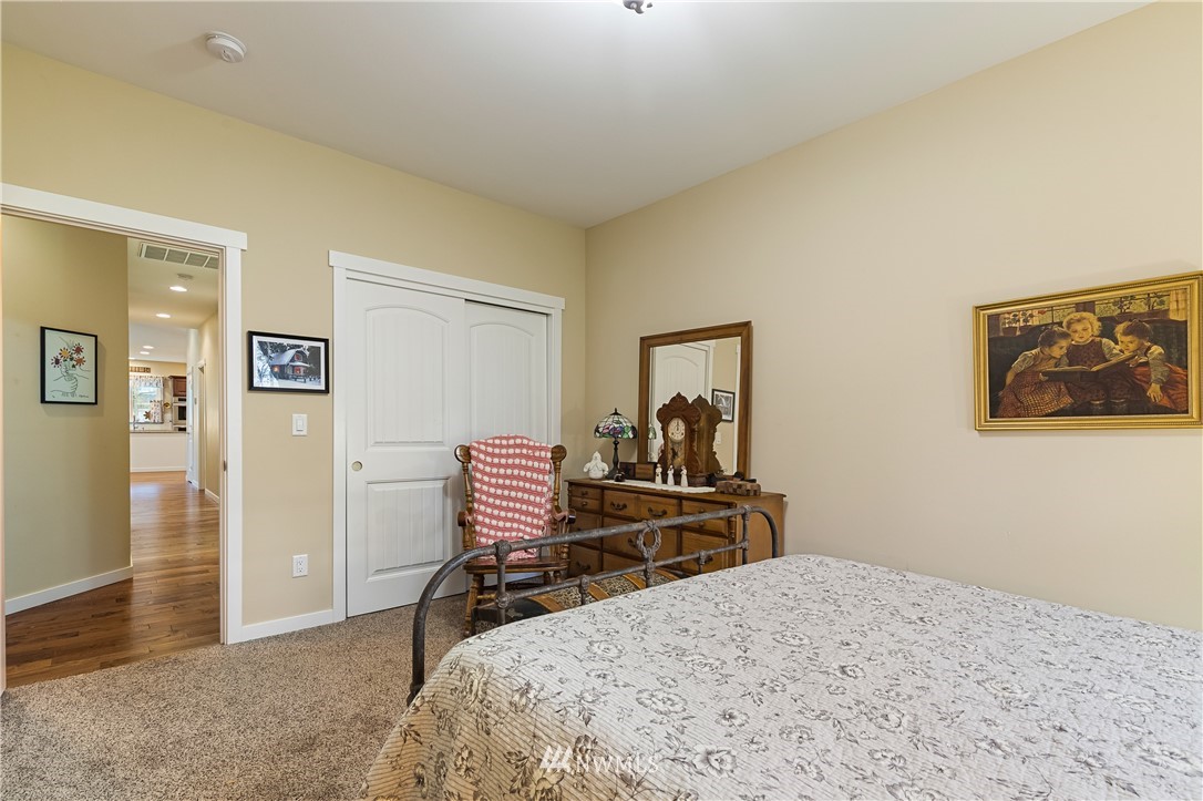 6800 Goodwin Road Everson, WA 98247 - Photo 29 of 40 a bedroom with a bed and furniture