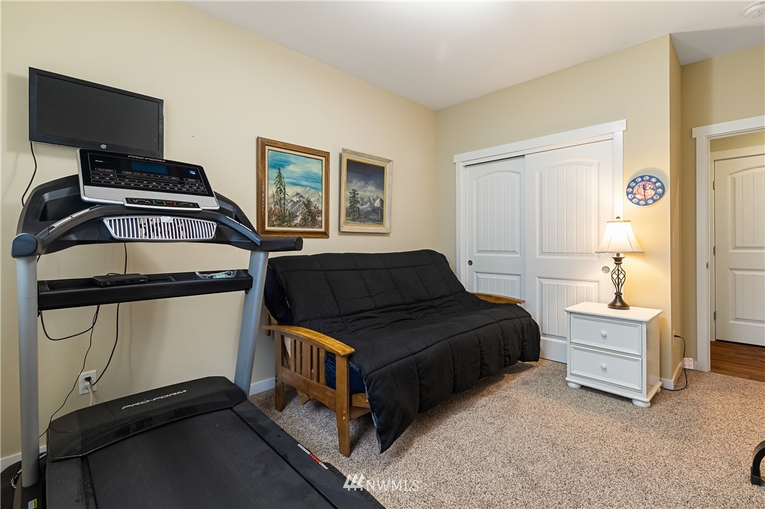 6800 Goodwin Road Everson, WA 98247 - Photo 30 of 40 a bedroom with a bed and a window
