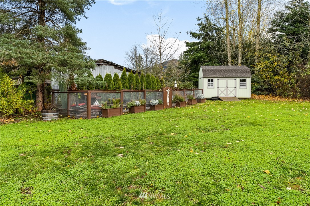 6800 Goodwin Road Everson, WA 98247 - Photo 37 of 40 a view of a house with a backyard
