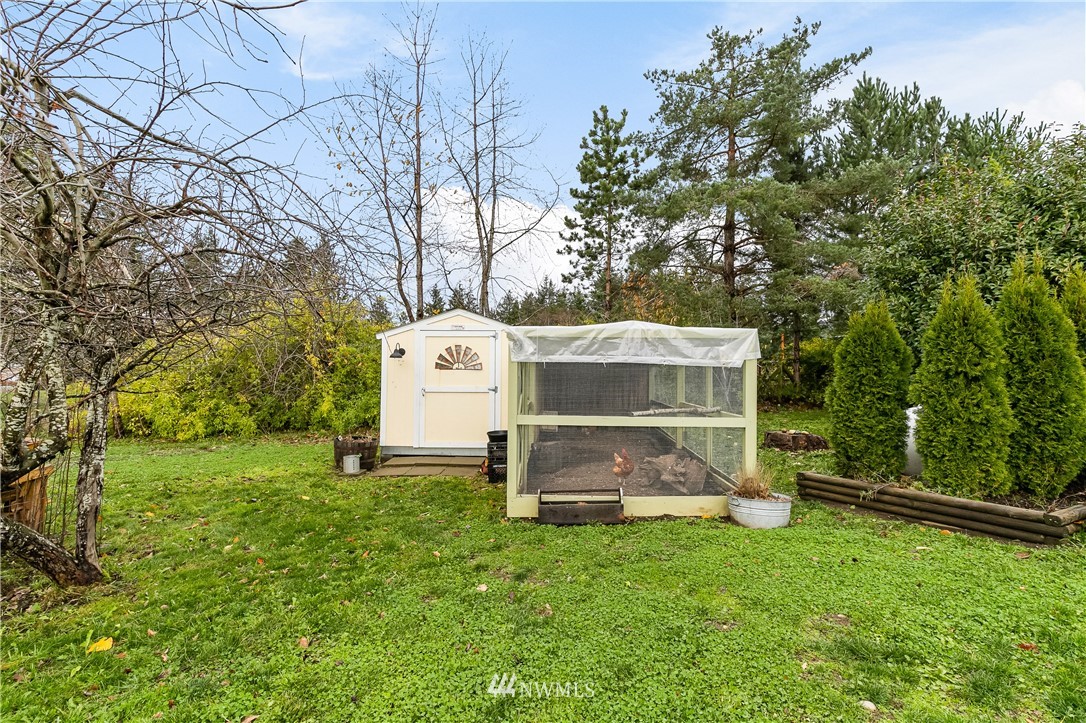 6800 Goodwin Road Everson, WA 98247 - Photo 38 of 40 a view of a tiny house with backyard