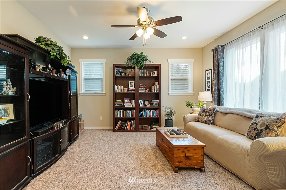 6800 Goodwin Road Everson, WA 98247 - Photo 8 of 40 a living room with furniture and a flat screen tv