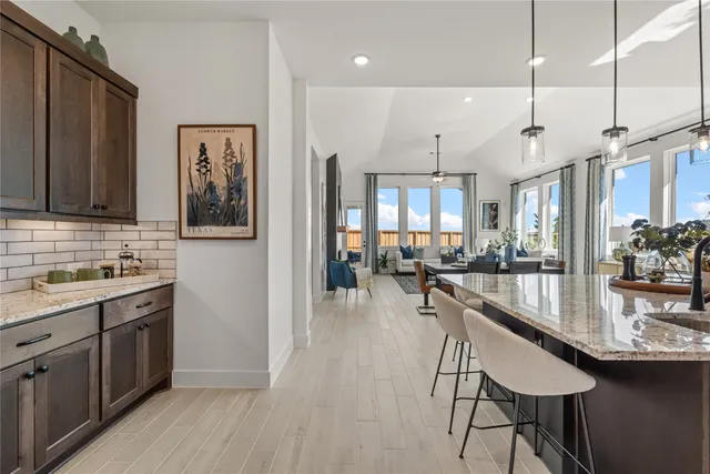 a view of a lake with a house in the background