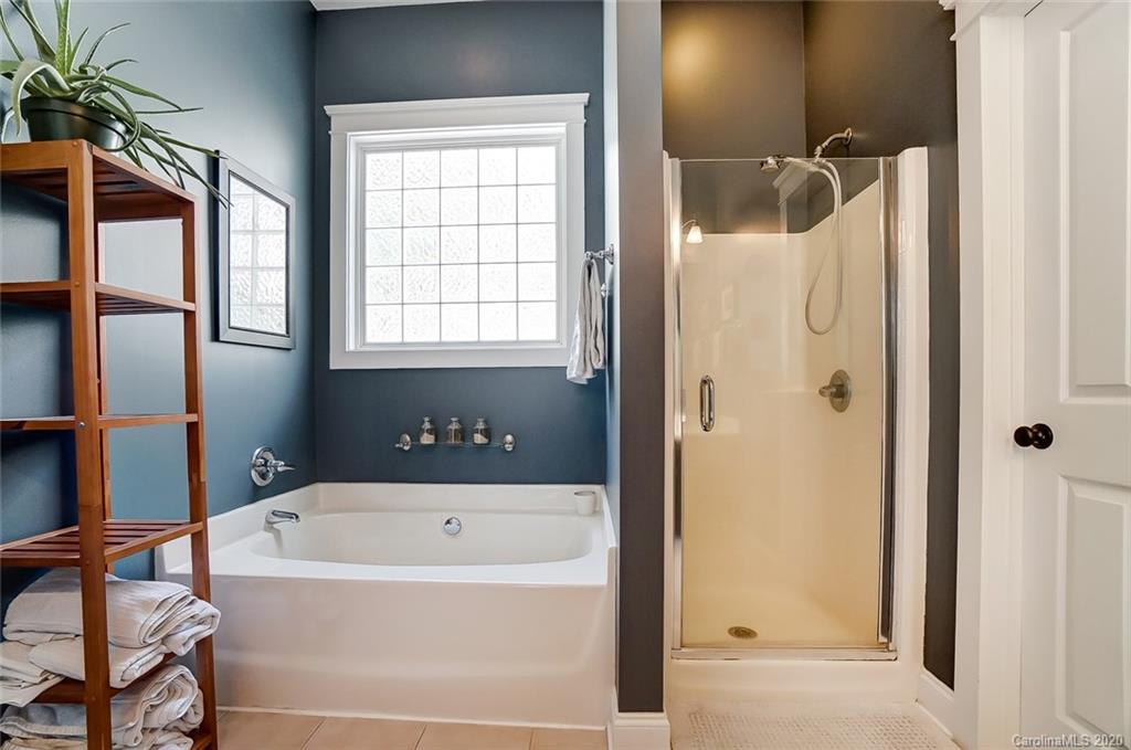 3261 Richard's Crossing Fort Mill, SC 29708 - Photo 22 of 48 a bathroom with a bathtub and a shower