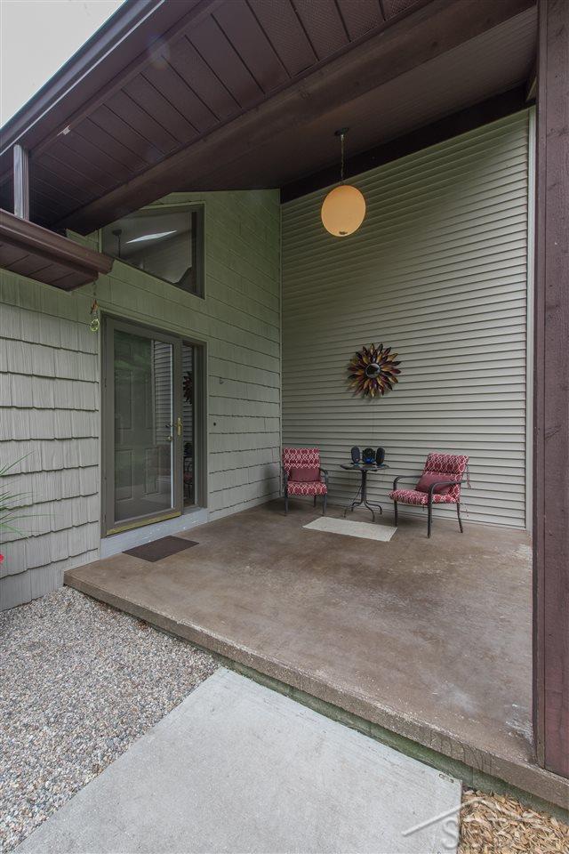 3201 Pomranky Road Midland, MI 48640 - Photo 20 of 29 The covered front porch will keep your guests dry when they come to visit. This is also an excellent place to sit and enjoy the natural environment of your front yard. Notice the exquisite details suc