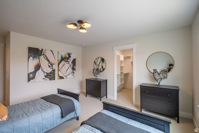 209 North 1140 West Mapleton, UT 84664 - Photo 16 of 21 Bedroom with carpet and a spacious closet