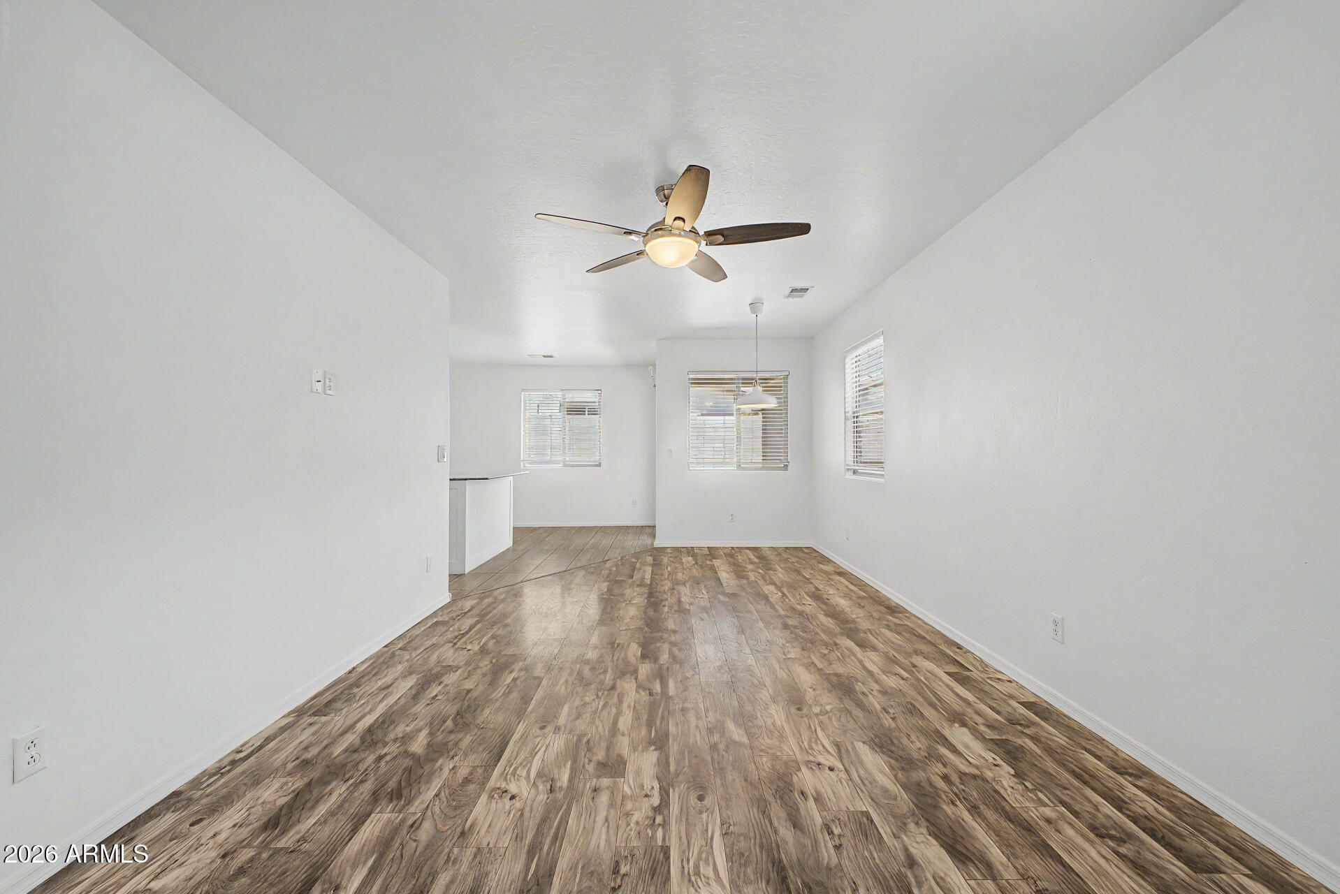 1882 West Rd Agent Street Apache Junction, AZ 85120 - Photo 5 of 26 wooden floor in an empty room