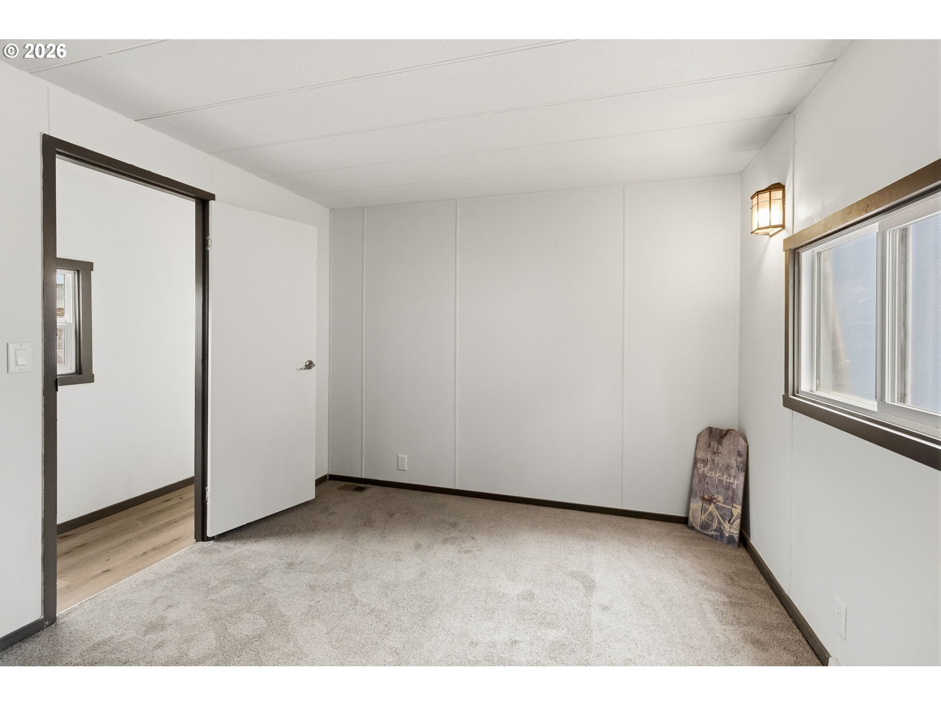 205 South 54th Street, Unit 76 Springfield, OR 97478 - Photo 20 of 41 a view of an empty room and window