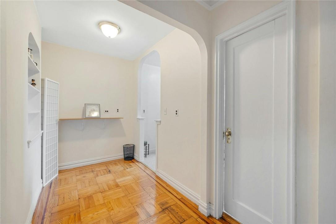 2025 Valentine Avenue, Unit 6B Bronx, NY 10457 - Photo 9 of 15 Laundry room featuring light parquet flooring