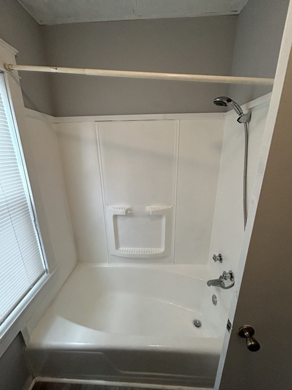 623-631 Birch Street, Unit 1 Fall River, MA 02724 - Photo 7 of 17 a bathroom with a bathtub