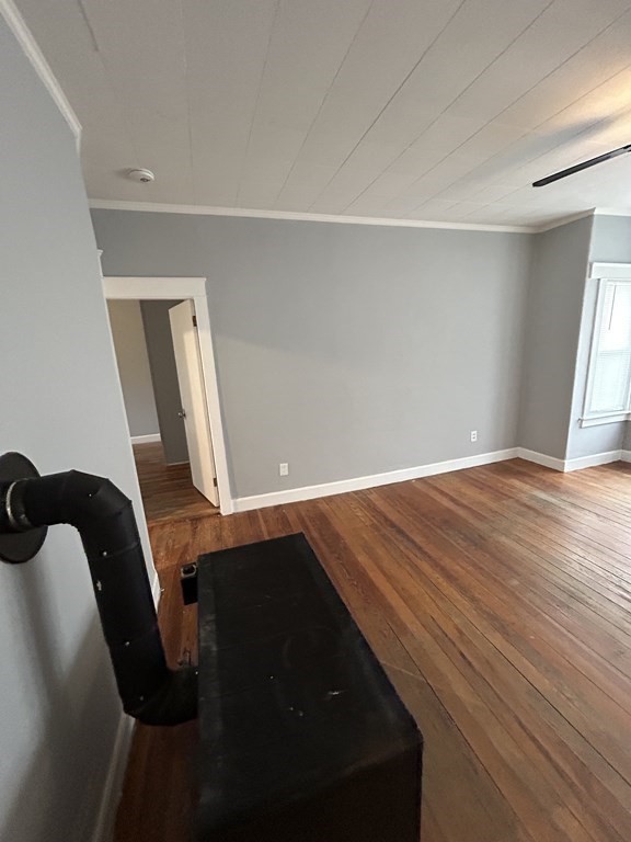 623-631 Birch Street, Unit 1 Fall River, MA 02724 - Photo 10 of 17 a view of an empty room with wooden floor