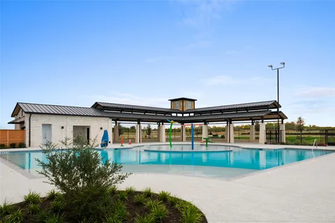 a view of a house with a swimming pool
