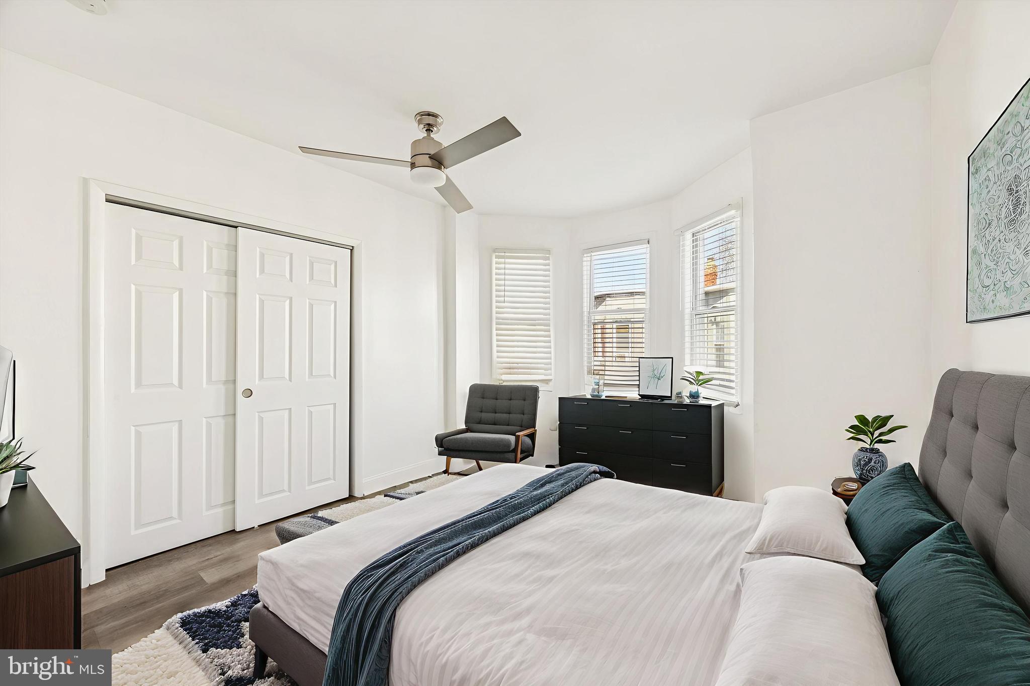 2336 Pierce Street Philadelphia, PA 19145 - Photo 8 of 18 a bedroom with a bed and a couch