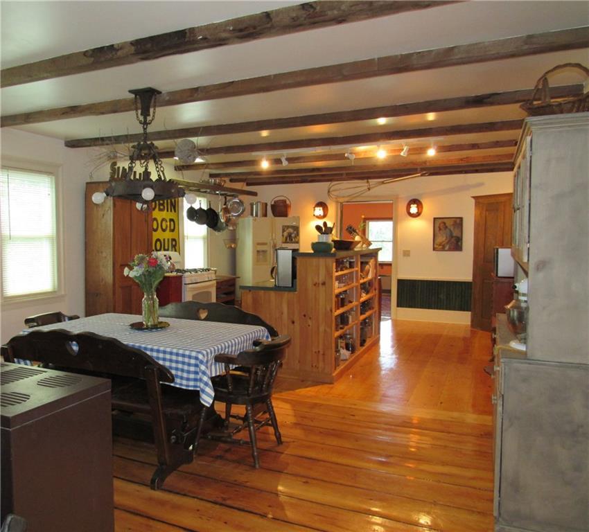 357 Kendall Corner Road Belfast, ME 04915 - Photo 9 of 35 Bright airy kitchen with beams.