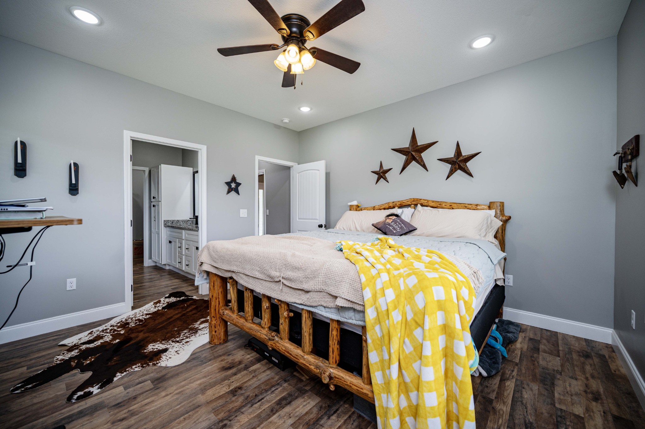 536 Frank Anderson Road Sparta, TN 38583 - Photo 17 of 25 a bedroom with a bed and a chandelier