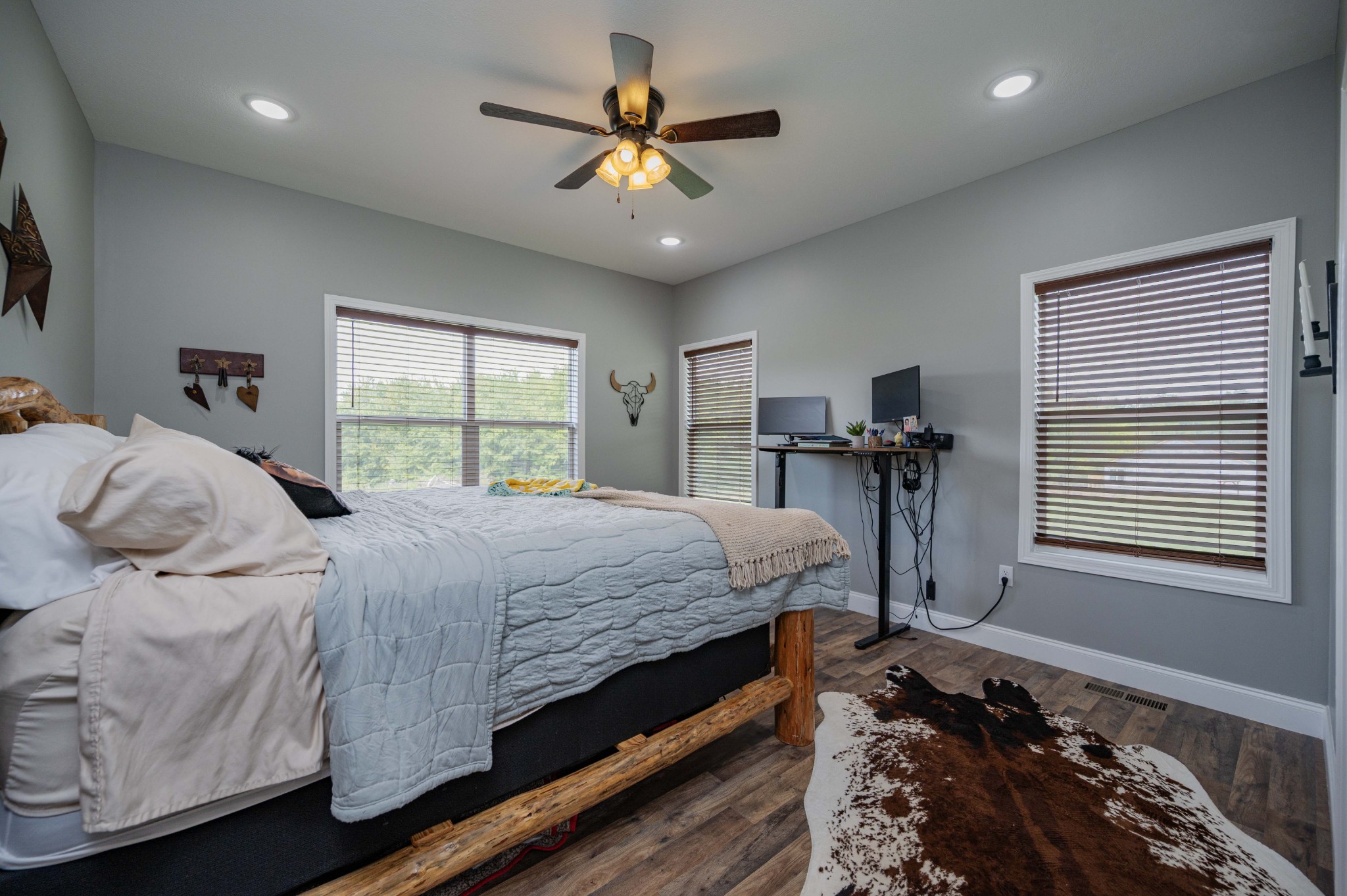 536 Frank Anderson Road Sparta, TN 38583 - Photo 18 of 25 a bedroom with bed and a chandelier