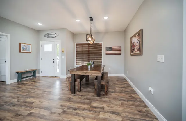 a view of a dining room with furniture
