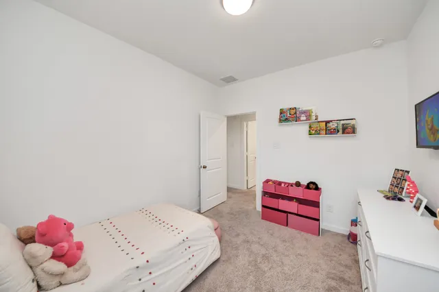 a living room with a sink furniture and a window