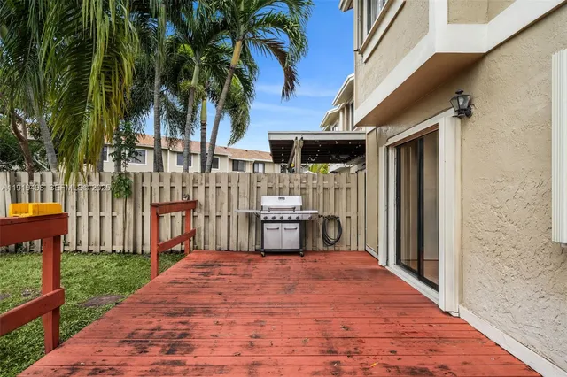 a front view of house with yard and outdoor seating