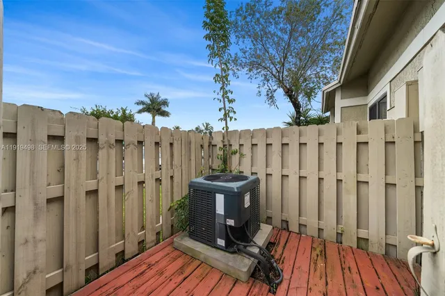 a view of a swimming pool with a lake view